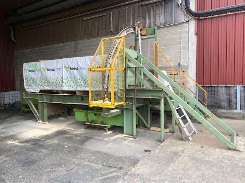 tronçonneuse à paquet en poste fixe 